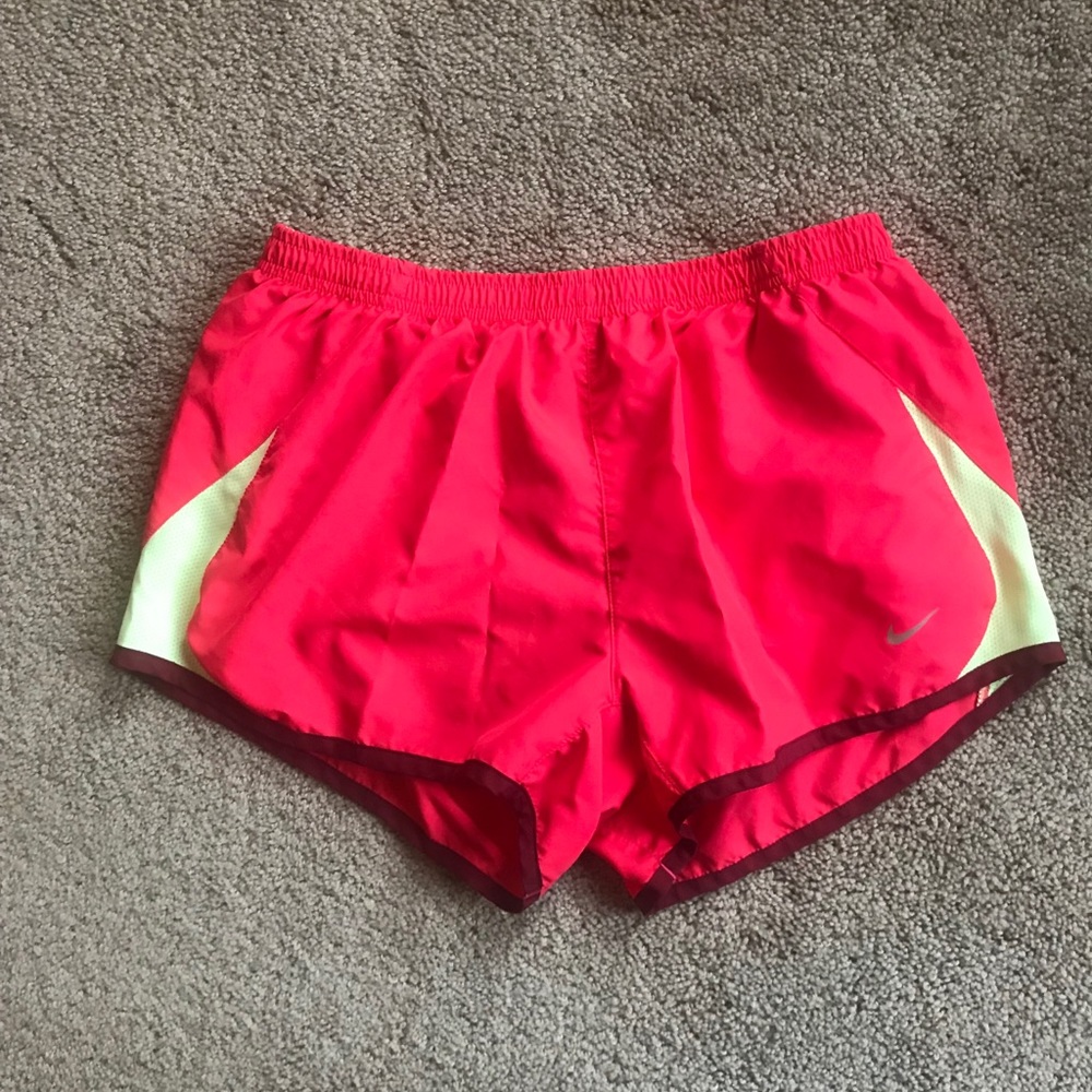 Pink and yellow Nike shorts